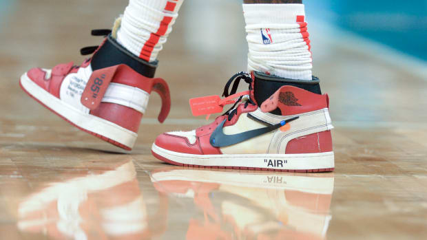View of red and white Jordan sneakers.